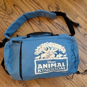 Disney Animal Kingdom Blue Duffle Bag. Crossbody Shoulder Strap, Zipper